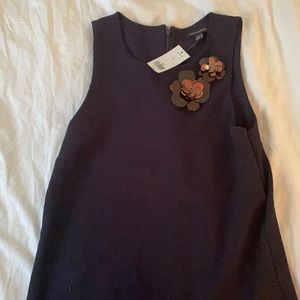 Banana Republic sleeveless blouse w/ broach detail